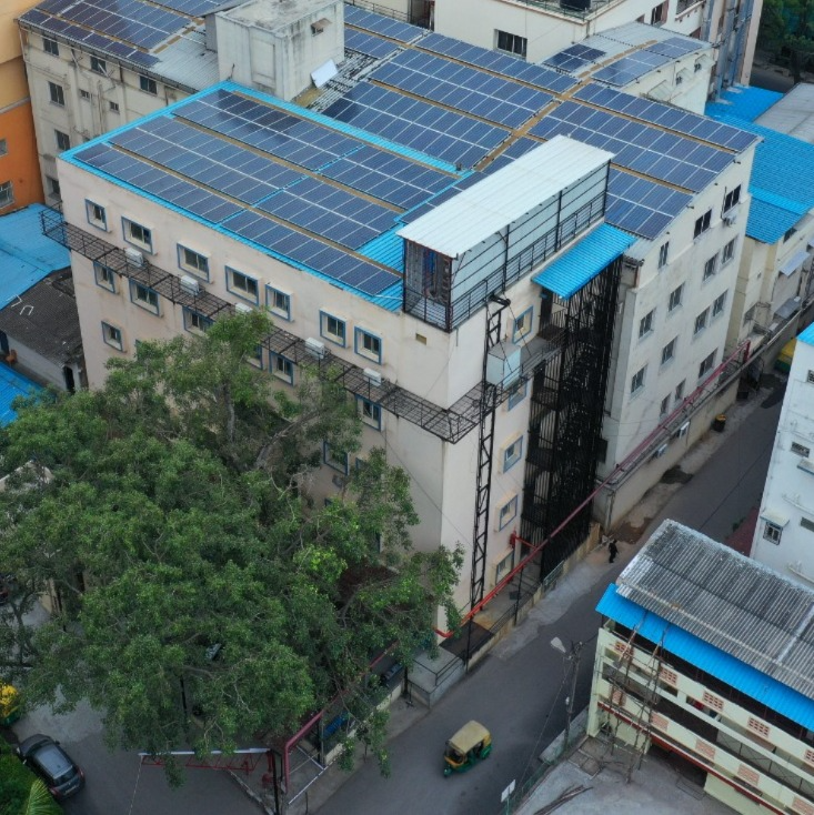 Aerial view of the BKF dialysis centre building in Bengaluru with rooftop solar panels